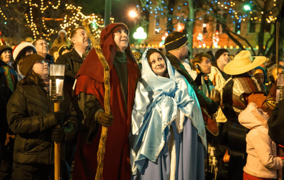 christmas customs from around the world man and woman dressed as mary and josephy at las posadas